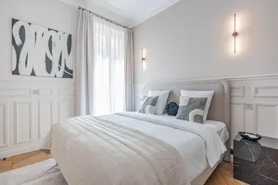 Un ou plusieurs lits dans un hébergement de l'établissement My Paris Apartments - Saint Germain