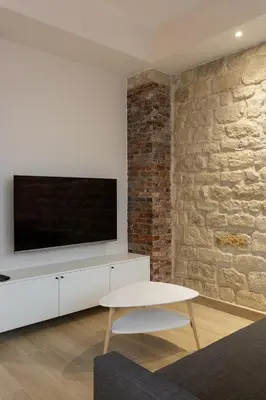 Télévision ou salle de divertissement dans l'établissement Modern duplex 10 min from Place de la Nation