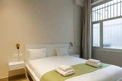 Un ou plusieurs lits dans un hébergement de l'établissement Modern duplex 10 min from Place de la Nation