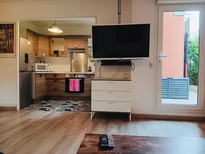 Cuisine ou kitchenette dans l'établissement Habitation Keira Stade de France