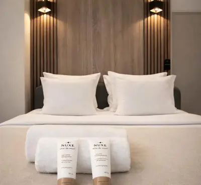 Un ou plusieurs lits dans un hébergement de l'établissement Montparnasse - Premium apartment with lift and balcony for 6