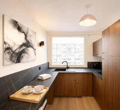 Cuisine ou kitchenette dans l'établissement Montparnasse - Premium apartment with lift and balcony for 6