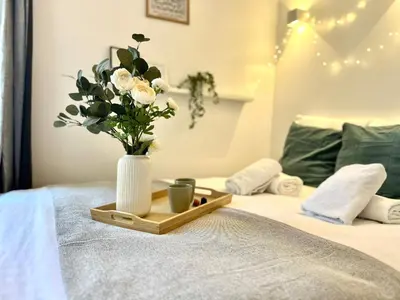Un ou plusieurs lits dans un hébergement de l'établissement New 144 Suite Falk - Cosy Apartment Paris Center