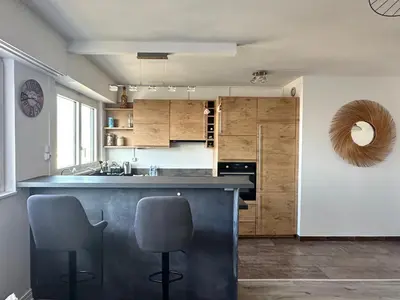 Cuisine ou kitchenette dans l'établissement Le Gémeaux - Paris - La Défense vue d'exception