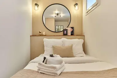 Un ou plusieurs lits dans un hébergement de l'établissement Charming Apartment - Paris Pere Lachaise