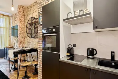 Cuisine ou kitchenette dans l'établissement Charming Apartment - Paris Pere Lachaise