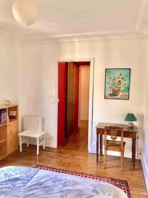 Un ou plusieurs lits dans un hébergement de l'établissement Appartement spacieux et lumineux