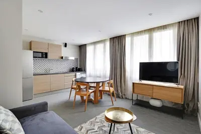 Cuisine ou kitchenette dans l'établissement Appartement cosy - Porte de Versailles