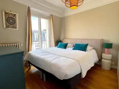 Un ou plusieurs lits dans un hébergement de l'établissement le Penthouse Murat L