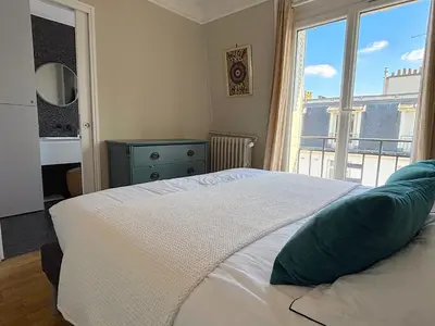 Un ou plusieurs lits dans un hébergement de l'établissement le Penthouse Murat L