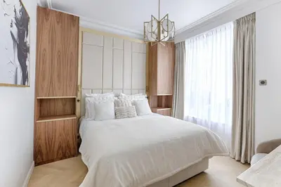 Un ou plusieurs lits dans un hébergement de l'établissement Maison en Ville près de Champs de Mars 4BD - The Eiffel Tower