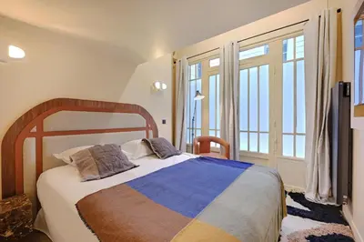 Un ou plusieurs lits dans un hébergement de l'établissement NoChichi-Collections - Hotel de Ville