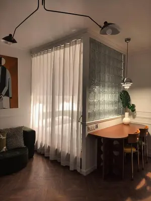 Coin salon dans l'établissement Eiffel Tower 6-Min Walk Charming Studio 3 sleeper