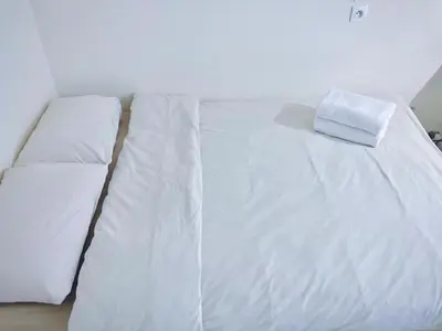Un ou plusieurs lits dans un hébergement de l'établissement Cozy Studio near the Eiffel Tower Central 7th N7-21