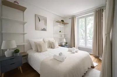 Un ou plusieurs lits dans un hébergement de l'établissement Spacieux appartement de 2 pièces à Montmartre