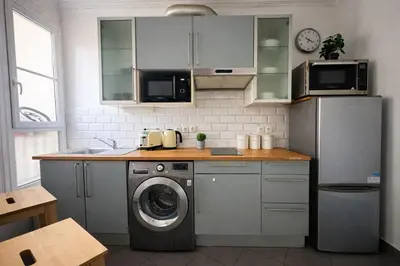 Cuisine ou kitchenette dans l'établissement Spacieux appartement de 2 pièces à Montmartre