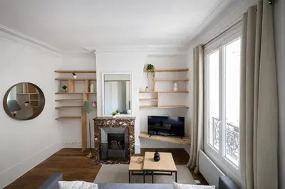 Coin salon dans l'établissement Spacieux appartement de 2 pièces à Montmartre