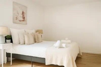 Un ou plusieurs lits dans un hébergement de l'établissement Spacieux 3 chambres et lumineux à Montrouge
