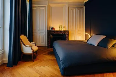 Un ou plusieurs lits dans un hébergement de l'établissement Elegant apartment, Avenue des Champs-Élysées