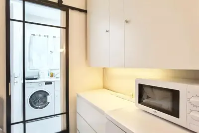 Cuisine ou kitchenette dans l'établissement Cozy Single Flat in Paris 16th District Elevator N16-142