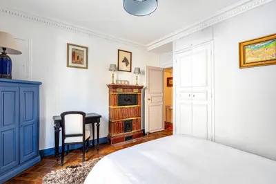 Un ou plusieurs lits dans un hébergement de l'établissement GuestReady - Unique apt close to Montmartre