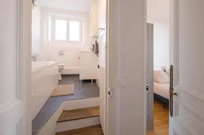 Un ou plusieurs lits dans un hébergement de l'établissement Eiffel Tower View 3BR Balcony