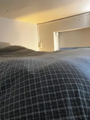 Un ou plusieurs lits dans un hébergement de l'établissement Nice place Paris center
