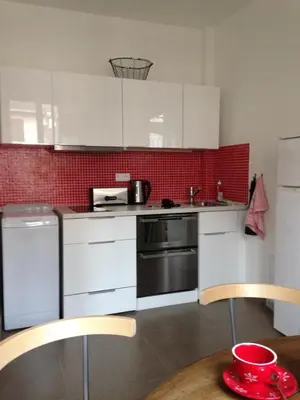 Cuisine ou kitchenette dans l'établissement Appartement Comme Une Petite Maison