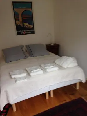 Un ou plusieurs lits dans un hébergement de l'établissement Appartement Comme Une Petite Maison