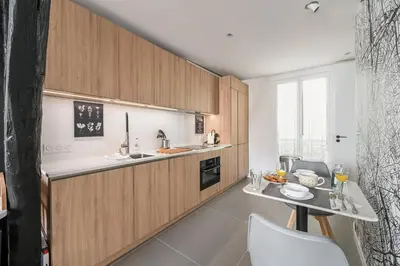 Cuisine ou kitchenette dans l'établissement Appartement lumineux à Paris - Welkeys