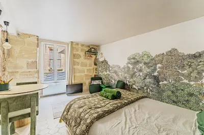 Un ou plusieurs lits dans un hébergement de l'établissement Charming Studio close to Notre-Dame de Paris
