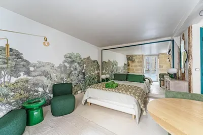 Un ou plusieurs lits dans un hébergement de l'établissement Charming Studio close to Notre-Dame de Paris
