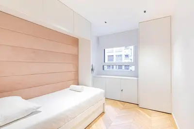 Un ou plusieurs lits dans un hébergement de l'établissement GuestReady - Spacious apt for 5 in mid-term renting