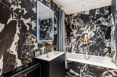 Salle de bains dans l'établissement GuestReady - Spacious apt for 5 in mid-term renting