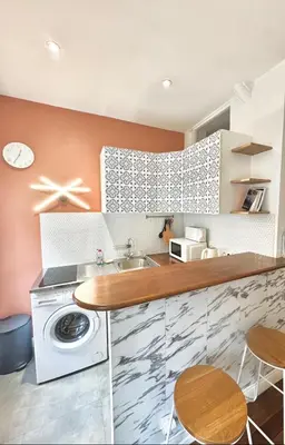 Cuisine ou kitchenette dans l'établissement Suite City Cathedrale-Notre-Dame