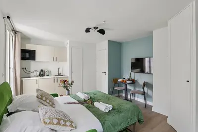 Un ou plusieurs lits dans un hébergement de l'établissement Lavie Maison Studio Close to Montmartre