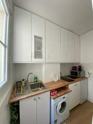 Cuisine ou kitchenette dans l'établissement Appartement Tour Eiffel