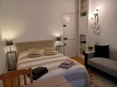 Un ou plusieurs lits dans un hébergement de l'établissement Appartement Tour Eiffel
