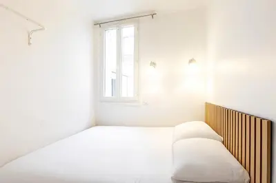 Un ou plusieurs lits dans un hébergement de l'établissement GuestReady - Comfortable 2 rooms apt for 4 people