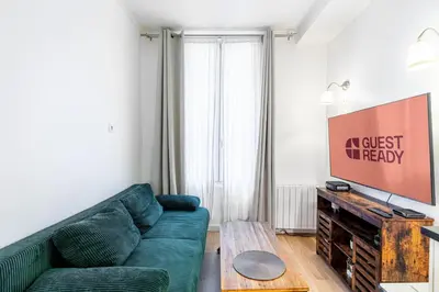 Coin salon dans l'établissement GuestReady - Comfortable 2 rooms apt for 4 people