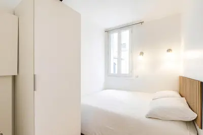 Un ou plusieurs lits dans un hébergement de l'établissement GuestReady - Comfortable 2 rooms apt for 4 people