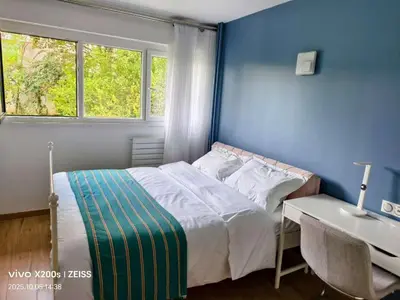 Un ou plusieurs lits dans un hébergement de l'établissement Nico's Appart