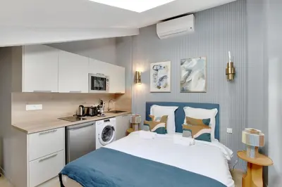 Cuisine ou kitchenette dans l'établissement Charmant et central - Neuilly
