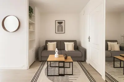 Coin salon dans l'établissement Magnifique appartement au 17 eme