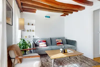 Coin salon dans l'établissement Cosy apartment - Eiffel Tower