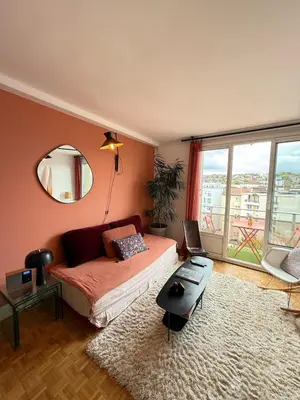 Coin salon dans l'établissement Appartement familial - 5 pers - Portes de Paris