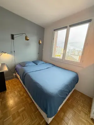 Un ou plusieurs lits dans un hébergement de l'établissement Appartement familial - 5 pers - Portes de Paris