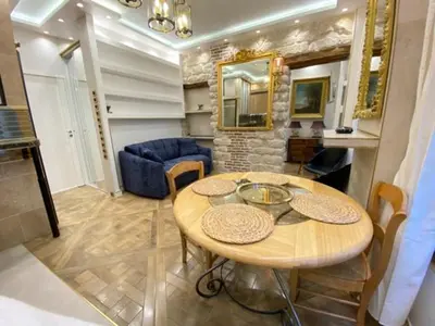 Coin salon dans l'établissement Elegant appartement dans ancien hotel particulier