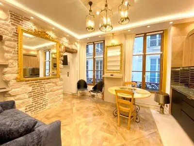 Coin salon dans l'établissement Elegant appartement dans ancien hotel particulier