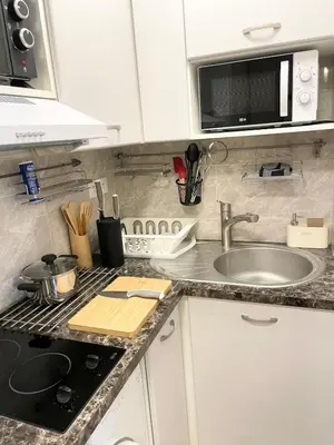 Cuisine ou kitchenette dans l'établissement New Modern Apartment in Paris Center Metro 7 & 14 Maison Blanche